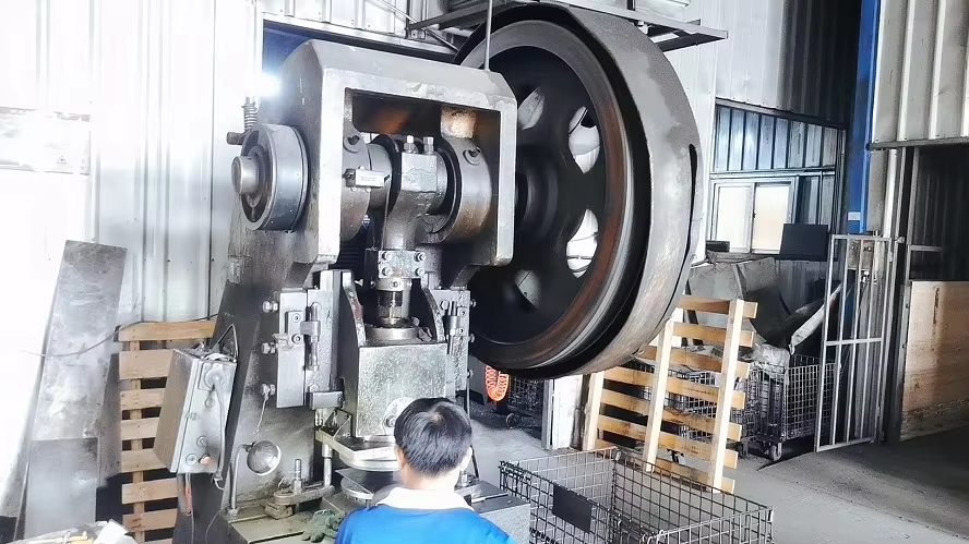40-foot shipping container being loaded by forklift at Brace export yard